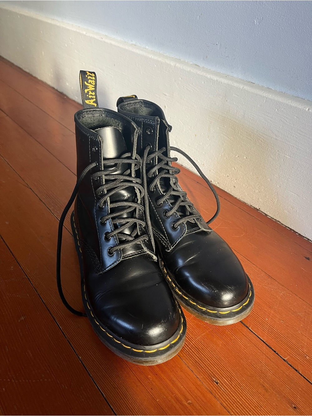 Dr. Martens Black Leather 8-Eye Lace-Up Boots with Yellow Stitching